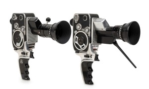 BOLEX-PAILLARD: Three c. 1960s 8mm movie cameras, each with lens hood and pistol-grip attachment - one P1 Zoom Reflex with lens cap, one P2 Zoom Reflex with lens cap, and one P3 Zoom Reflex. (3 movie cameras)