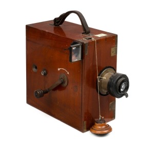 WILLIAMSON KINEMATOGRAPH COMPANY: Pioneering hand-cranked 35mm ciné camera, c. 1910, with Carl Zeiss Jena Tessar f7.5 lens [#236188], folding Newton finder, wooden lens cap, and photographer's permit for King George V's March 1914 visit to Wallasey.