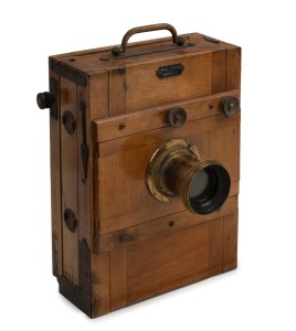 BIAL & FREUND: 13 x 18cm plate tropical wood tailboard camera, c. 1870, with unmarked lens.