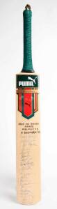 "Puma" Cricket Bat endorsed "Save the Rhino Games, Melville CC, 4 December 02", with 19 signatures including Greg Matthews, Kim Hughes, Rod Hogg & Merv Hughes.