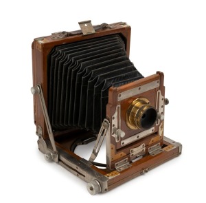 VAGEESWARI: Indian-made 4¾ x 6½" plate field camera, c. 1950s, with fixed-focus brass lens and aluminium fittings.