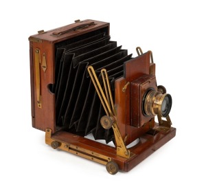 SANDERSON: 4¾ x 6½" plate field camera, c. 1890s, with Beck Symmetrical lens and roller-blind shutter.