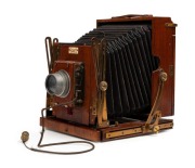 HOUGHTON: 'Sanderson Junior' 4&frac34; x 6 &frac12;" plate triple-extension field camera, c. 1903, with Beck Isosticmar 6.25" f5.8 lens [#114636],&nbsp;Thornton-Pickard roller-blind shutter,&nbsp;and Watson Bowden 'The Antinuous' shutter release cable. - 3