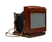 HOUGHTON: 'Sanderson Junior' 4&frac34; x 6 &frac12;" plate triple-extension field camera, c. 1903, with Beck Isosticmar 6.25" f5.8 lens [#114636],&nbsp;Thornton-Pickard roller-blind shutter,&nbsp;and Watson Bowden 'The Antinuous' shutter release cable. - 4