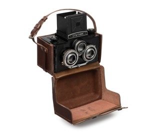 GOMZ: Sputnik stereo 120 film TLR camera [#18515], c. 1955, with twin T-22 75mm f4.5 lenses [#047997] and matching leather case with 'Sputnik' imprint.