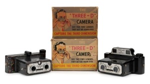 CORONET: Two c. 1953 "3-D" stereo cameras, both in maker's box - one rare speckled version together with one black version with viewfinder. (2 cameras)