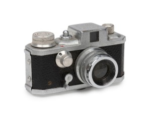 MORITA TRADING: Kiku 16 Model II subminiature camera, c. 1956, with matching leather case.