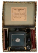 ERNST PLANK: Children's magic lantern, height 23.5cm, in maker's box with nine glass slides, c. 1890s. - 4