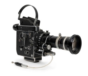 BOLEX-PAILLARD: H16 SBM 16mm movie camera [#304731], c. 1950s, with Poe Bolex H16RX Kern Vario-Switar 16-100mm f1.9 lens [#1124917], lens cap, and shutter release cable.