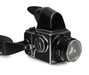 HASSELBLAD: Circa 1970 Hasselblad 500 C/M SLR camera [#RI1295285] with Planar 80mm f2.8 lens, in flight case with&nbsp;a large number of Hasselblad&nbsp;accessories: one Sonnar 250mm f5.6 and one S-Planar 135mm f5.6 lens, three additional camera backs, two bellows, - 2