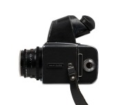 HASSELBLAD: Circa 1970 Hasselblad 500 C/M SLR camera [#RI1295285] with Planar 80mm f2.8 lens, in flight case with&nbsp;a large number of Hasselblad&nbsp;accessories: one Sonnar 250mm f5.6 and one S-Planar 135mm f5.6 lens, three additional camera backs, two bellows, - 4
