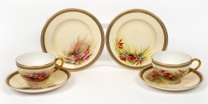 ROYAL WORCESTER pair of antique English teacup, saucer and plate sets hand-painted with Australian wildflowers titled "Christmas Bush" and "Heath", signed "R. Austin", (6 items), puce factory mark to bases and retailed by "Hardy Brothers Ltd,", the saucer