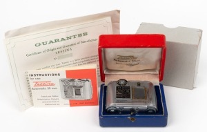 CONCAVA: Tessina Automatic 35 subminiature camera [#63514], c. 1960s, in chrome with Tessinon 25mm f2.8 lens. Offered in maker's box with instruction booklet and warranty card.