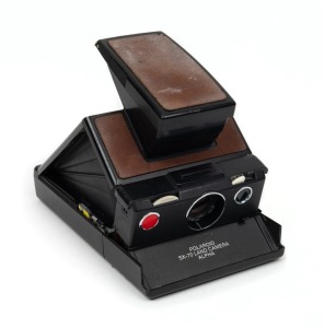 POLAROID: Black-body SX-70 Land Camera Alpha instant film camera, c. late 1970s.