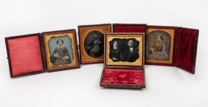 Group of four mid-19th century daguerreotype portrait photographs in latching leather bi-fold cases. (4 items)