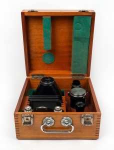 BECK LONDON: X0·3 microscope camera [#33930], c. 1930s, in wooden case with microscope stage and housing elements, two viewfinders, and three film holders.