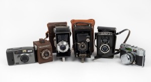 VARIOUS MANUFACTURERS: An accumulation of six different cameras - one Braun Carl Norca I in leather case, one Epson Colorio, one GOMZ Lubitel 2 in leather case, one Kodak Junior No. 1 Autographic in leather case, one Lumière Lux Box, and one Petri 2.8 Col