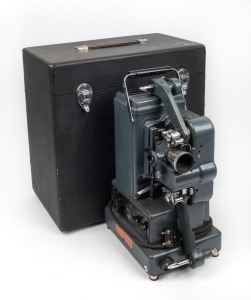 BOLEX-PAILLARD: Model G 16mm projector, c. 1936, in matching branded case with two lamp globes, bottle of lubricant, and reel element.