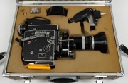 BOLEX-PAILLARD: H-16 Rex-5 16mm movie camera [#255012], c. 1972, with Poe Bolex H16RX Kern Vario-Switar 16-100mm f1.9 lens [#1119634] and lens cap, organised into flight case with pistol grip attachment and other accessories. - 4