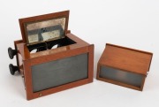 UNIS FRANCE: Two c. 1920s wooden handheld stereoscopes, one with variable focusing mechanism and measuring approx. 17 x 14.5 x 10cm, the other approx. 11.5 x 10 x 5.5cm. (2 items) - 2