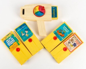 FISHER PRICE: '460 Movie Viewer' plastic toy, c. 1970s, with five popular children's animation cartridges. (6 items)