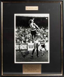 GARY ABLETT SR, signed photograph "The Mark of the Century. Gary Ablett marking over Gary Pert, Geelong vs Collingwood, MCG, Sunday May 8th 1994", limited edition 492/500, window mounted, framed & glazed, overall 45x57cm.
