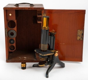 SWIFT & SON: Brass and steel 19th century microscope, 35.5cm at highest setting, in timber box with various additional elements.