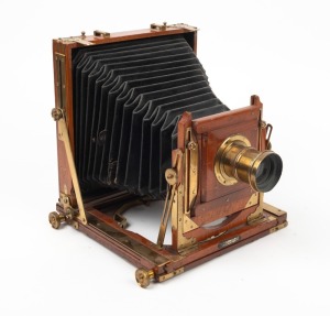 BUTCHER & SON: 'National' 4¾ x 6½" plate field camera, c. 1905, with lens with f8/11/16/22/32/44 aperture markings.