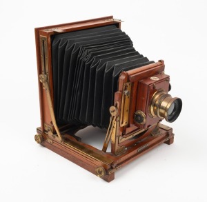 BUTCHER & SON: 'National' 4¾ x 6½" plate field camera, c. 1905, with Beck Symmetrical lens and Thornton-Pickard roller-blind shutter.