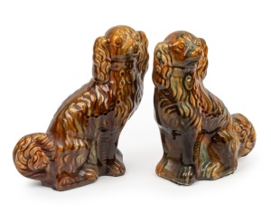 CORNWELL pair of pottery dog statues in the Staffordshire style, 27cnm high