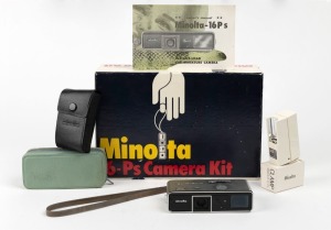 MINOLTA: Minolta 16-Ps Camera Kit [#858549], c. 1964, in maker's box with leather camera case, flash attachment with matching case, clamp attachment, and printed matter.