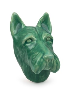 MELROSE WARE rare green glazed pottery terrier dog wall plaque, stamped "Melrose Ware, Australian" with remains of original label, 18cm high