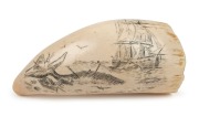 A scrimshaw whale's tooth engraved with whaling scene, 13cm long