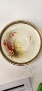ROYAL WORCESTER pair of antique English teacup, saucer and plate sets hand-painted with Australian wildflowers titled "Christmas Bush" and "Heath", signed "R. Austin", (6 items), puce factory mark to bases and retailed by "Hardy Brothers Ltd,", the saucer - 8