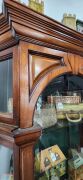 An antique English mahogany display cabinet with unusual drop-in door mechanism, metal shelf racking and chamfered sides, late 19th century, 204cm high, 89cm wide, 28cm deep - 6