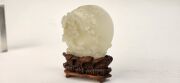 An antique Chinese jade ornament carved with blossom tree, on carved timber stand, Qing Dynasty, 18th/19th century, 8cm high overall - 3