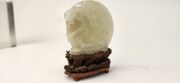 An antique Chinese jade ornament carved with blossom tree, on carved timber stand, Qing Dynasty, 18th/19th century, 8cm high overall - 5