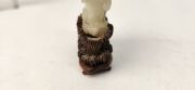 An antique Chinese jade ornament carved with blossom tree, on carved timber stand, Qing Dynasty, 18th/19th century, 8cm high overall - 13
