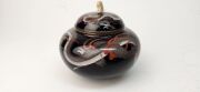 An antique Japanese cloisonne lidded pot decorated with dragon motif on black ground, with later carved ivory finial, Meiji Period, ​​​​​​​10cm high - 9