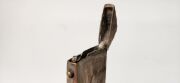 Six assorted novelty vestas including a bottle shaped example with cigar cutter end, pug dog, Punch & Judy, swaddled baby, smoking monkey and Pierrot clown, 19th and 20th century, (6 items), the largest 7.5cm high - 3