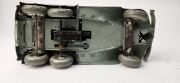 Two vintage Japanese clockwork tinplate armoured cars by T.N. TOYS, 20th century, 23cm long - 2