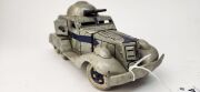 Two vintage Japanese clockwork tinplate armoured cars by T.N. TOYS, 20th century, 23cm long - 4