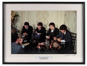 THE BEATLES IN AUSTRALIA, 1964: "Beatles Adelaide Press Conference, 1964". Original colour print, signed by Vic Grimmett in the lower margin, 24 x 37cm, 35 x 46.5cm overall.