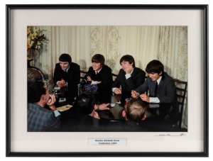 THE BEATLES IN AUSTRALIA, 1964: "Beatles Adelaide Press Conference, 1964". Original colour print, signed by Vic Grimmett in the lower margin,  24 x 37cm, 35 x 46.5cm overall.