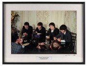 THE BEATLES IN AUSTRALIA, 1964: "Beatles Adelaide Press Conference, 1964". Original colour print, signed by Vic Grimmett in the lower margin,&nbsp; 24 x 37cm, 35 x 46.5cm overall.