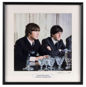 THE BEATLES IN AUSTRALIA, 1964: "John and Paul at Press Conference, Adelaide 1964". Original colour print, signed by Vic Grimmett in the lower margin, 24.5 x 24.5cm, 35 x 34cm overall.