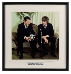 THE BEATLES IN AUSTRALIA, 1964: "Ernie Signley interviews John about his book, Adelaide 1964". Original colour print, signed by Vic Grimmett in the lower margin,  24.5 x 24.5cm, 35 x 34cm overall. 