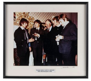 THE BEATLES IN AUSTRALIA, 1964: "George makes a point at Adelaide Town Hall Reception 1964". Original colour print, signed by Vic Grimmett in the lower margin,  4.5 x 29.5cm, 35 x 39cm overall. 