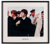 THE BEATLES IN AUSTRALIA, 1964: "John, Paul & Jim, Adelaide airport 1964". Original colour print, signed by Vic Grimmett in the lower margin, 24.5 x 29.5cm, 35 x 39cm overall.