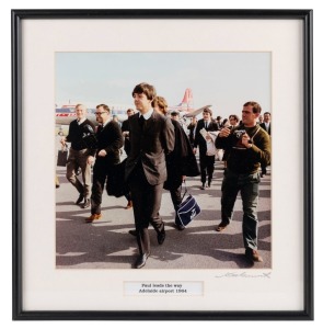THE BEATLES IN AUSTRALIA, 1964: "Paul leads the way, Adelaide airport 1964". Original colour print, signed by Vic Grimmett in the lower margin, 24.5 x 24.5cm, 35 x 34cm overall.